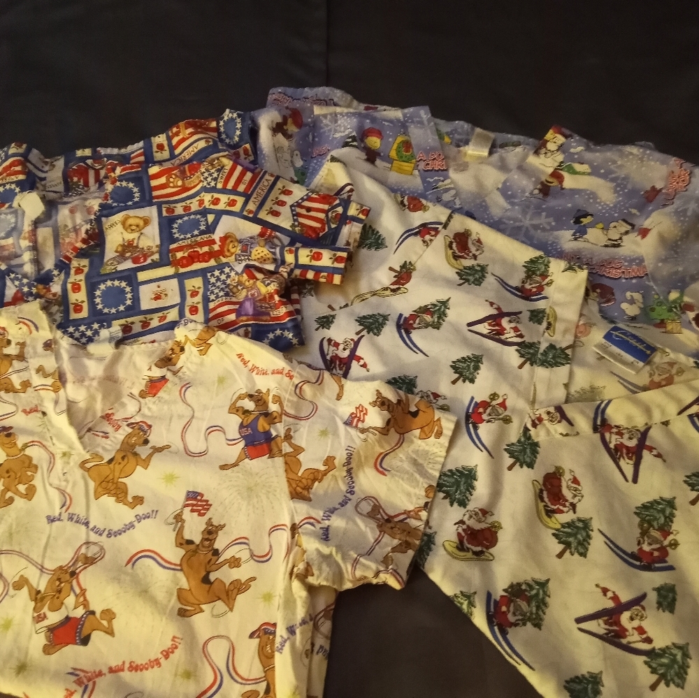 Lot of 4 holiday scrub tops. All fit like a large